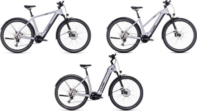 Zu sehen sind drei weiße Cube Nuride Hybrid E-Bikes, jeweils mit einem Diamant-Rahmen, ein Trapez-Rahmen und ein Tiefeinsteiger-Rahmen.