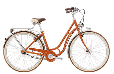 Zu sehen ist ein orangenes Retrobike, es hat einen Tiefeinsteiger-Rahmen.