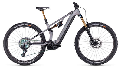 Zu sehen ist ein graues Cube Stereo Hybrid ONE44 HPC SLX E-Bike, mit goldenen Stoßdämpfern.